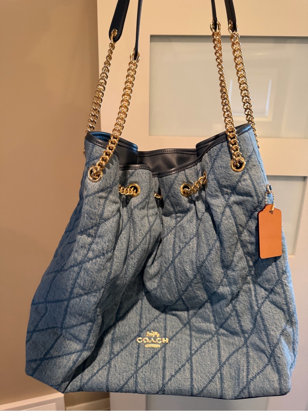 Coach Quilted Denim Drawstring Shoulder Bag in Light Blue with Gold Hardware